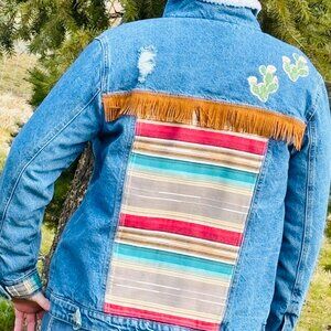 Upcycled Arizona theme western jacket with cactus appliques and brown fringe. L